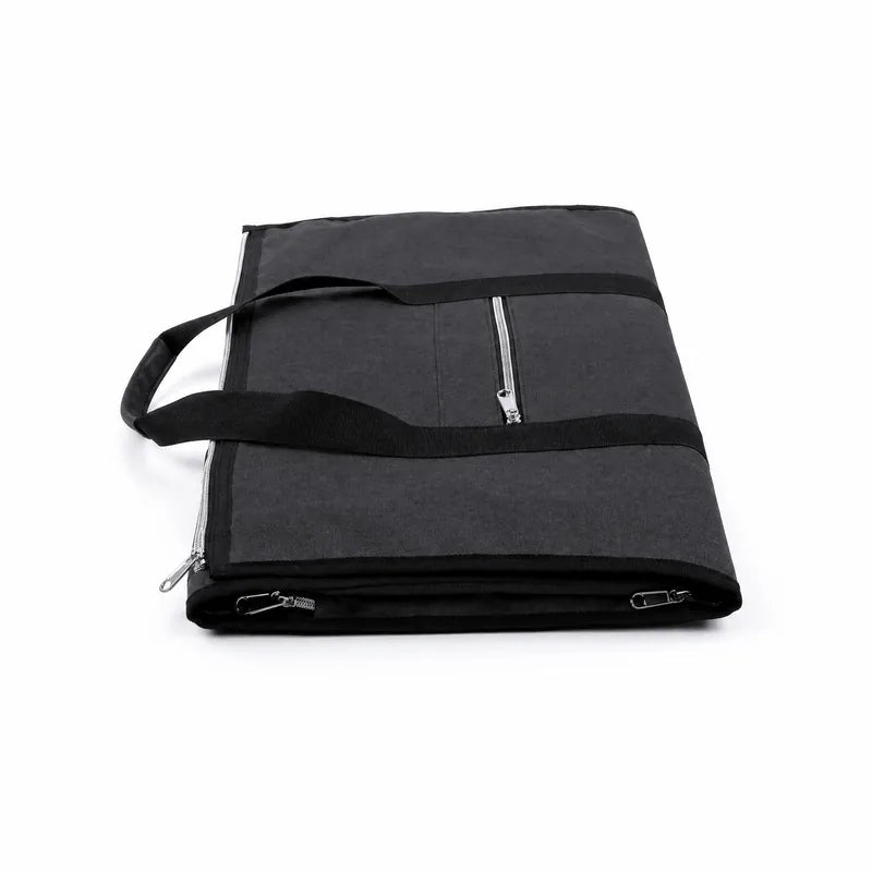 The garment duffle folded flat, showing the zip that runs around its edge